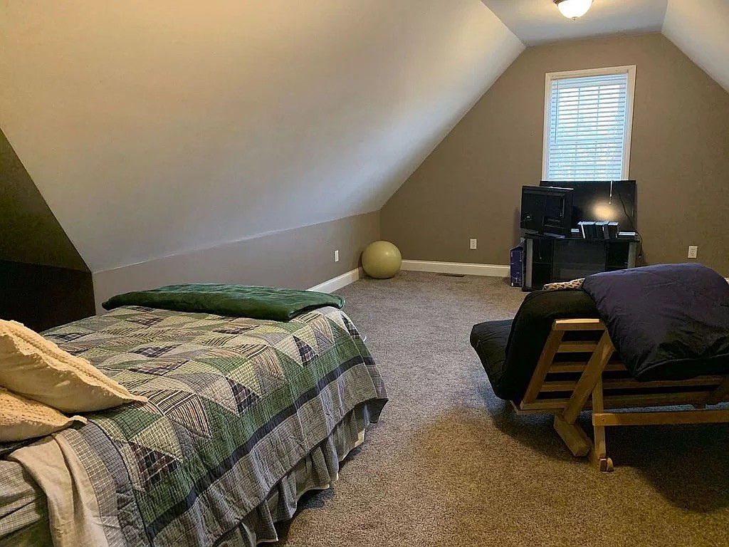 3685 South Hyde Road Springfield, TN 37172 - Photo 24 of 26 a bedroom with a bed and furniture