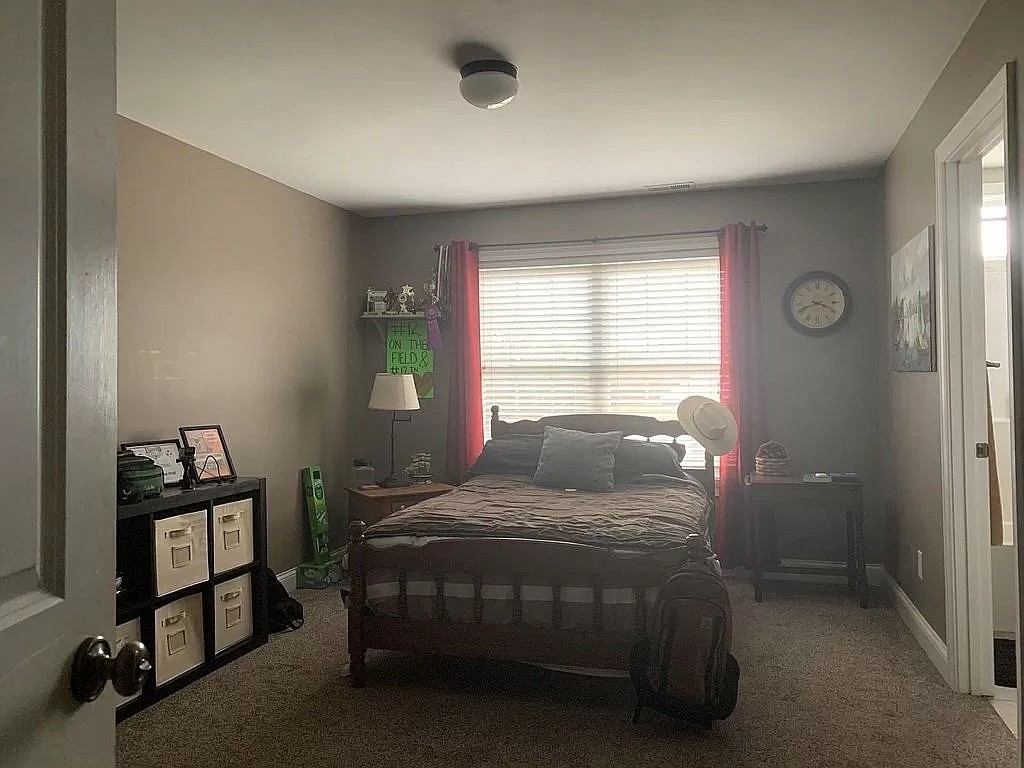 3685 South Hyde Road Springfield, TN 37172 - Photo 25 of 26 a bedroom with a bed and a window