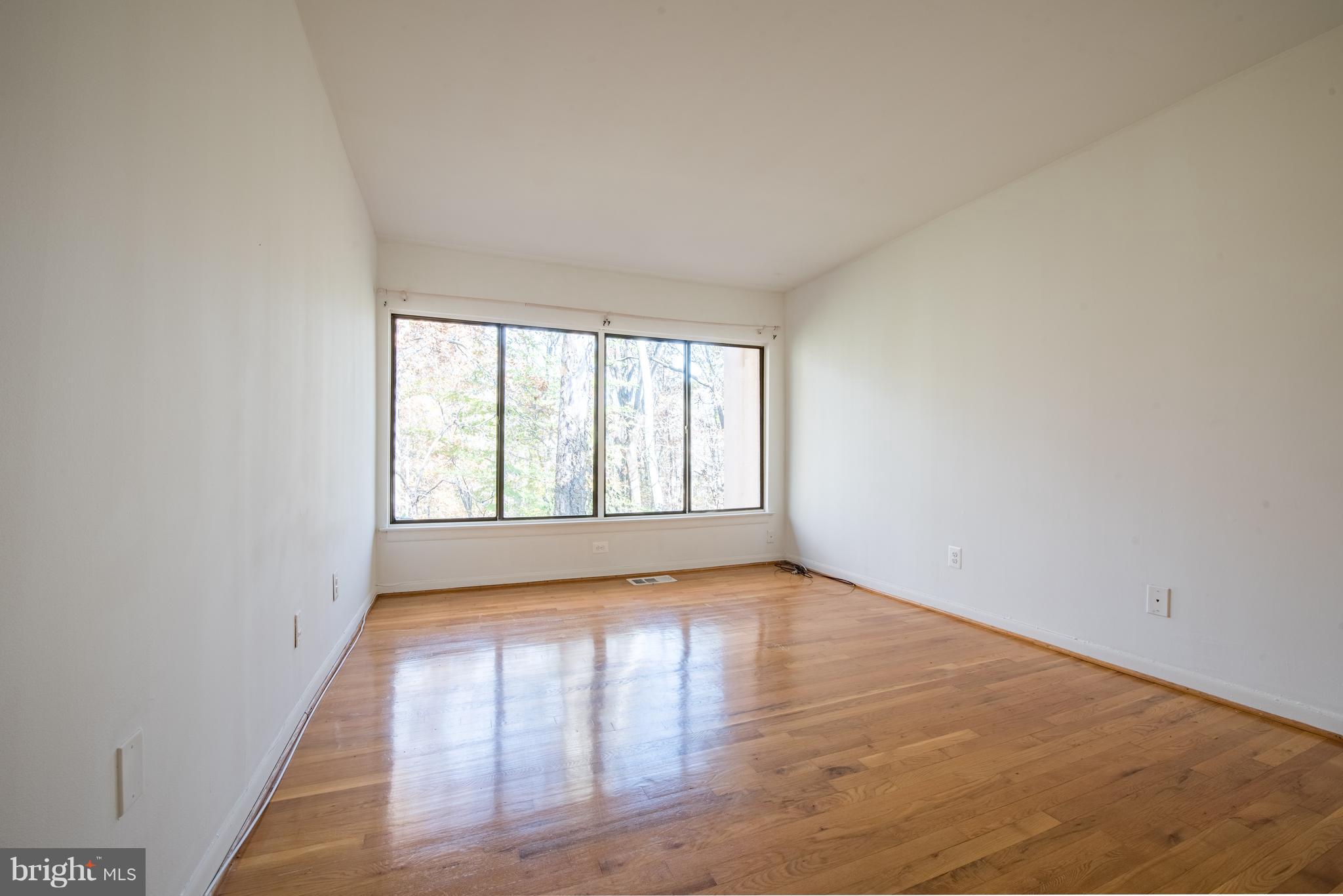 9616 Basket Ring Road Columbia, MD 21045 - Photo 15 of 22 MASTER BEDROOM W/HARDWOOD FLOORS