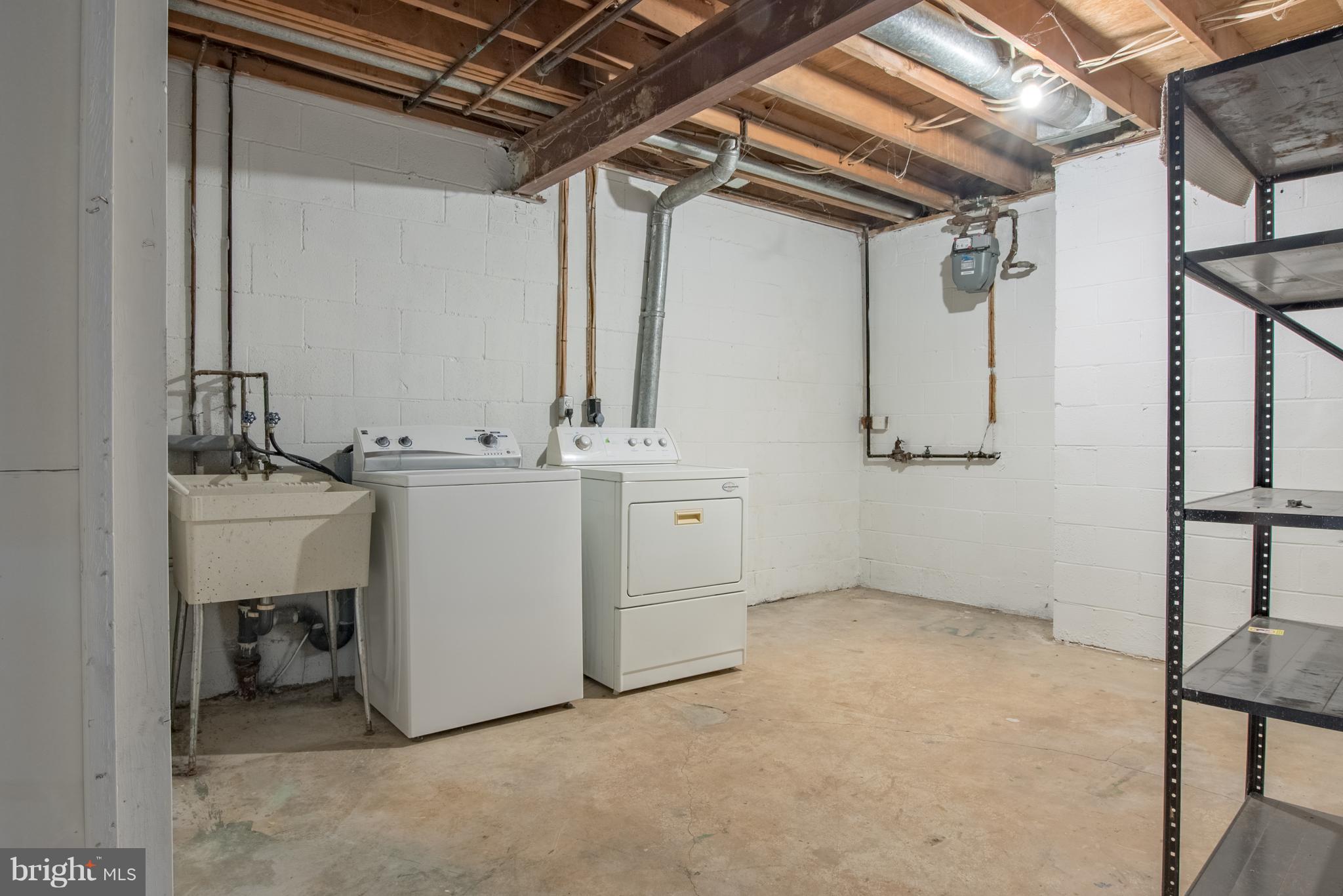 9616 Basket Ring Road Columbia, MD 21045 - Photo 20 of 22 UTILITY AREA & WASHER & DRYER
