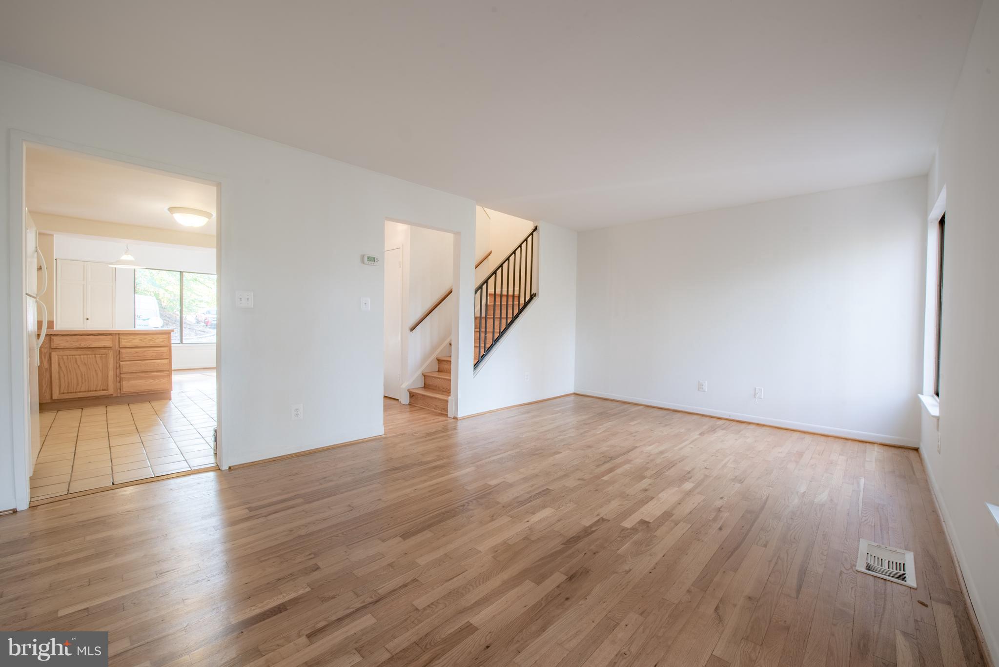 LARGE LIVING ROOM & DINING ROOM W/ HARDWOOD FLOORS