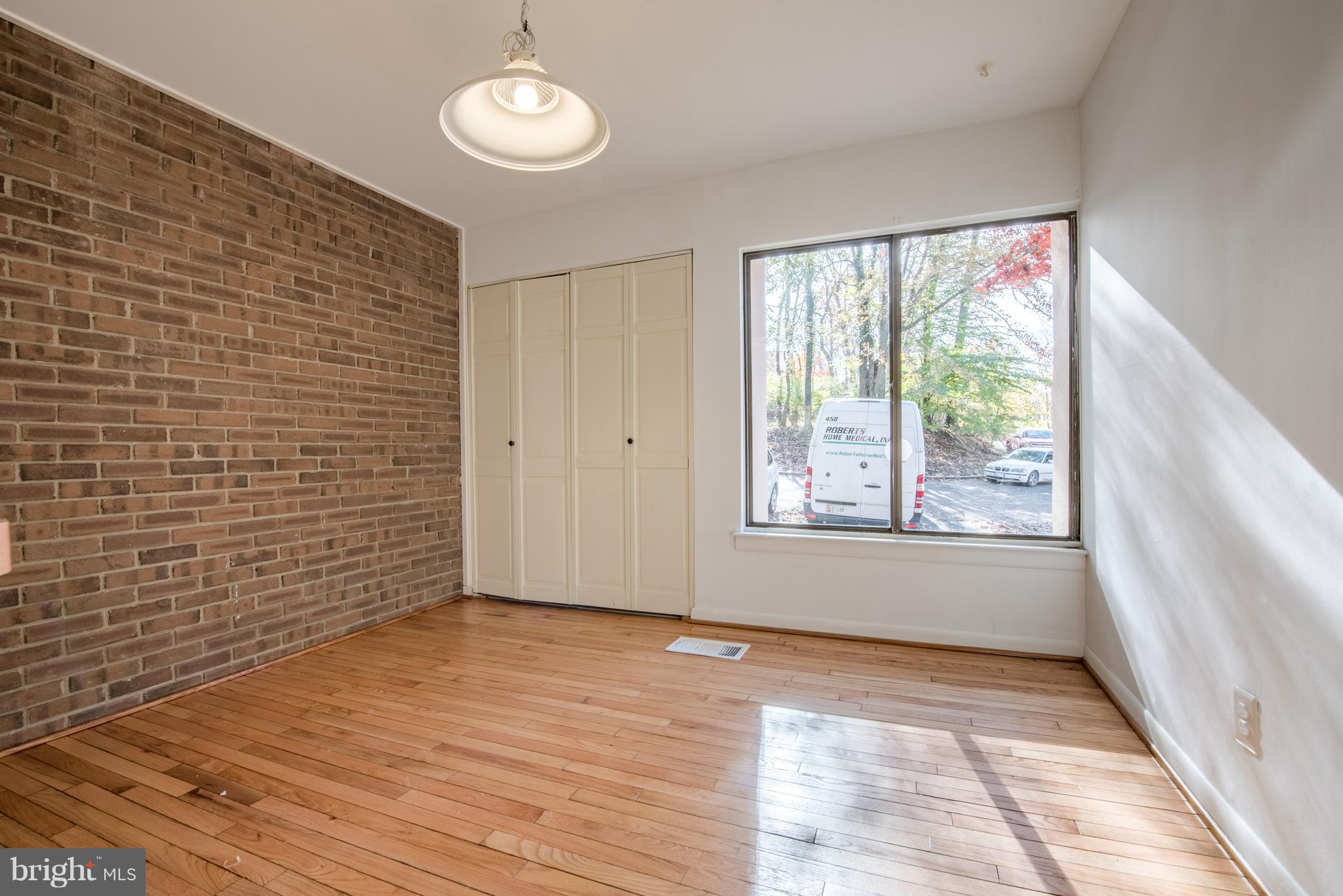 9616 Basket Ring Road Columbia, MD 21045 - Photo 10 of 22 EATING AREA OFF KITCHEN W/ HARDWOOD FLOORS