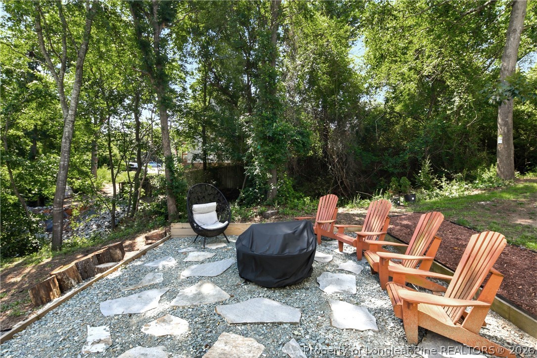 1075 Buffalo Lake Road Sanford, NC 27332 - Photo 42 of 49 a view of a patio with couple of chairs