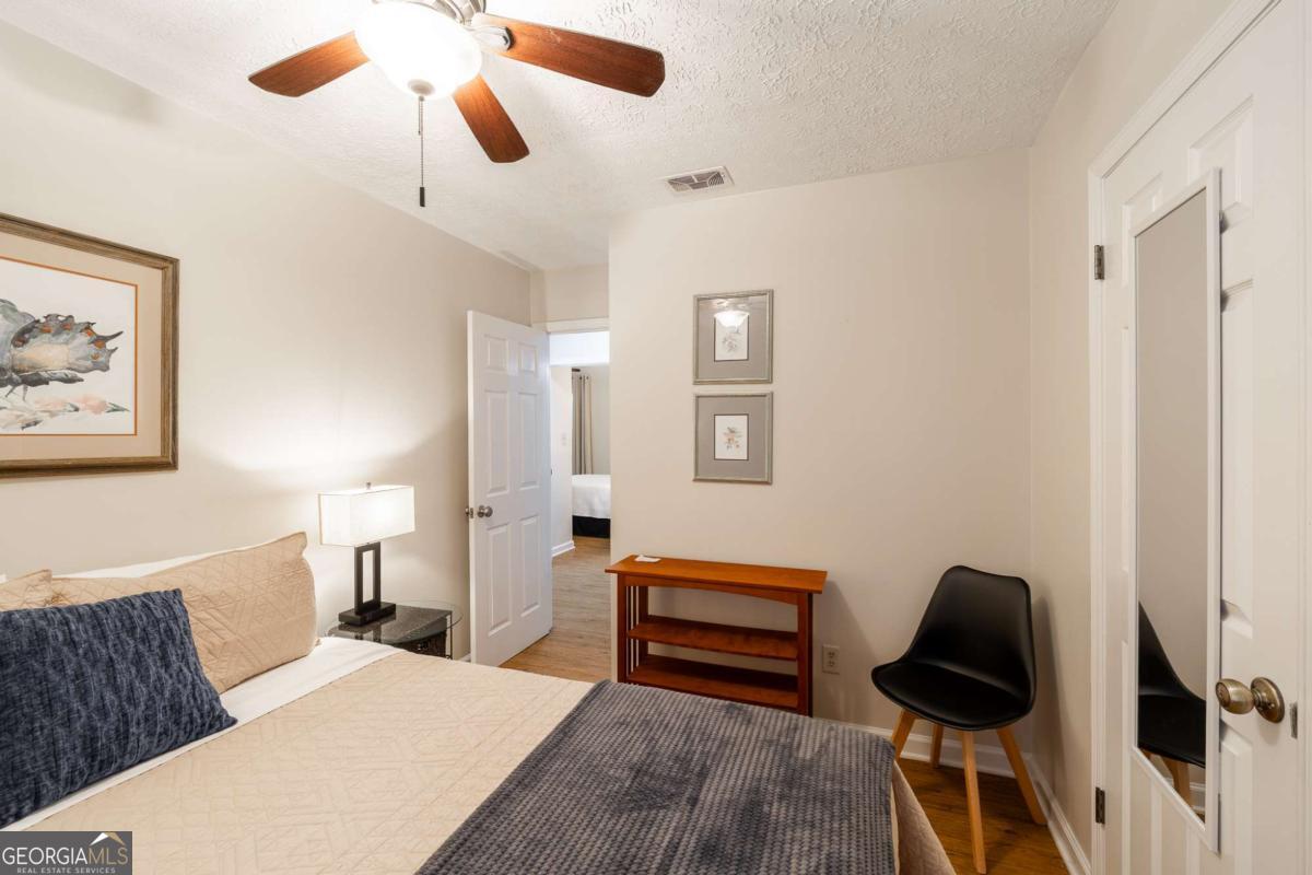 168 Pearl Street Athens, GA 30601 - Photo 25 of 43 a bedroom with furniture and a window