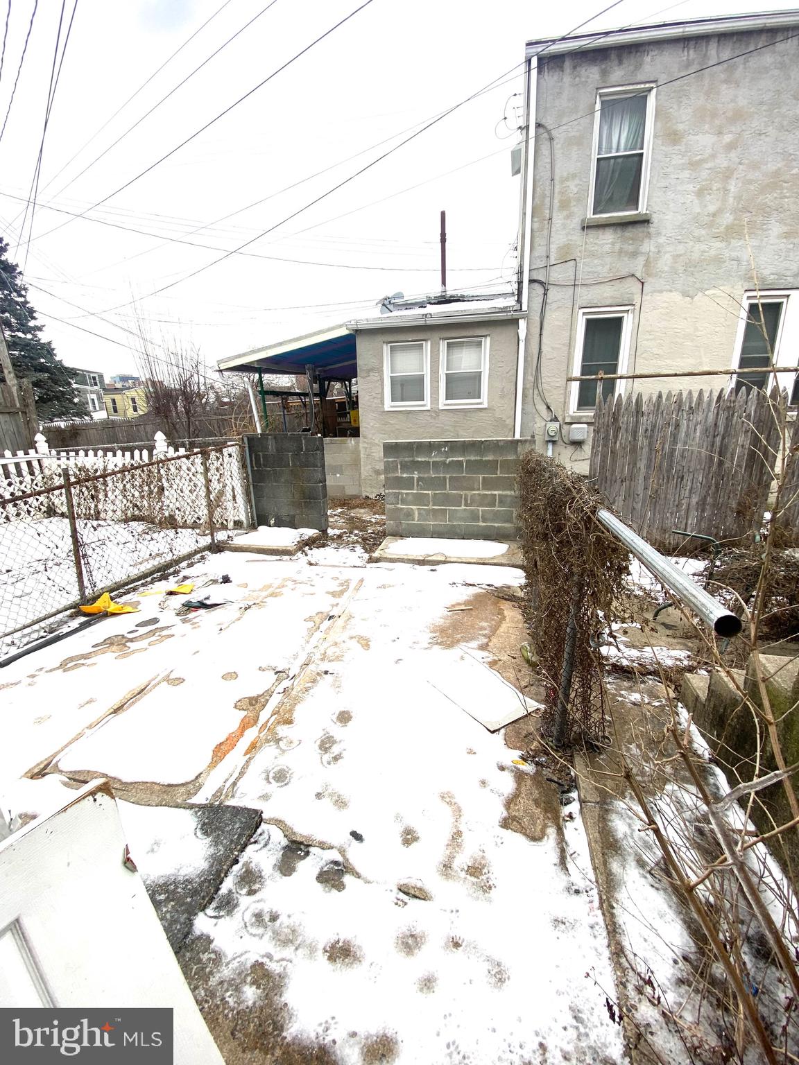 1163 Cotton Street Reading, PA 19602 - Photo 22 of 25 a view of a house with a snow on the road