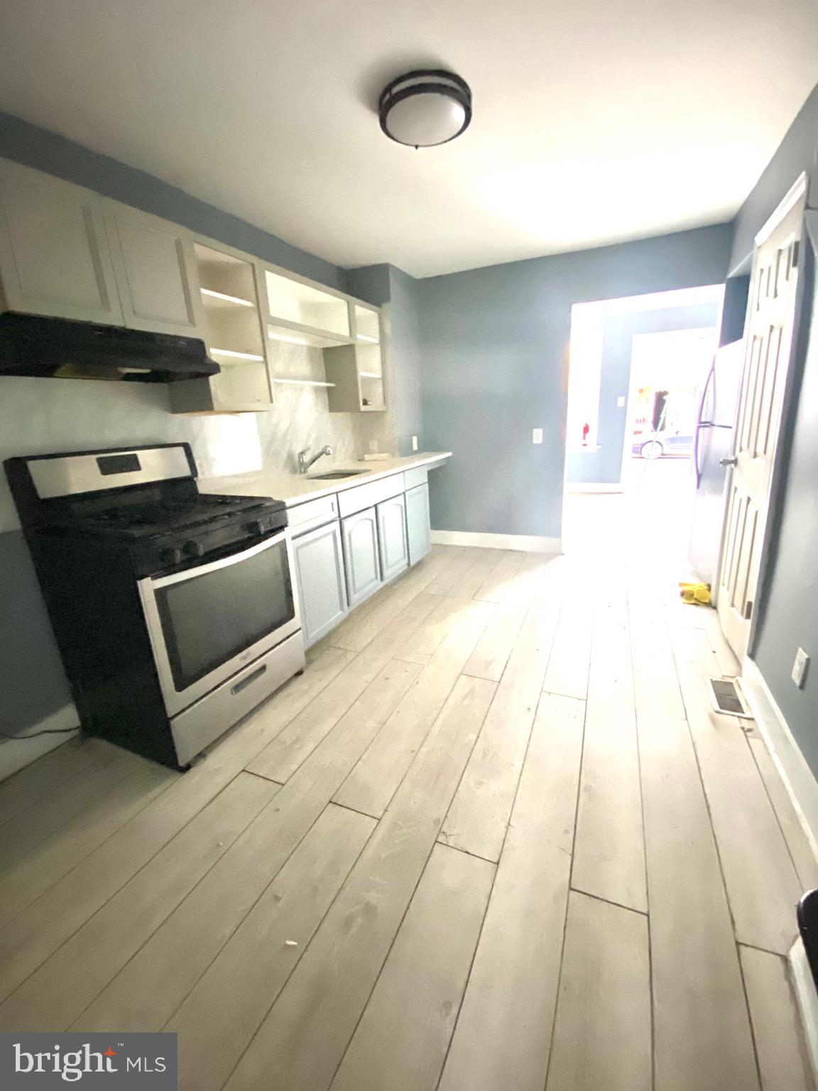 1163 Cotton Street Reading, PA 19602 - Photo 7 of 25 a view of kitchen with stainless steel appliances granite countertop a stove and a sink