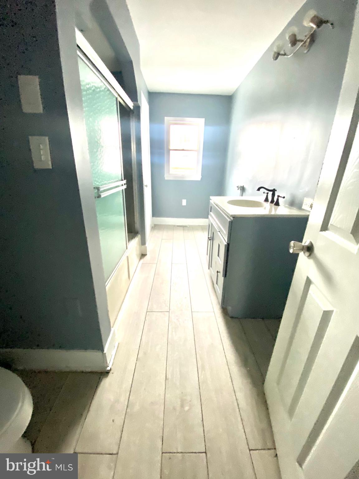 1163 Cotton Street Reading, PA 19602 - Photo 9 of 25 a entryway with furniture and a window