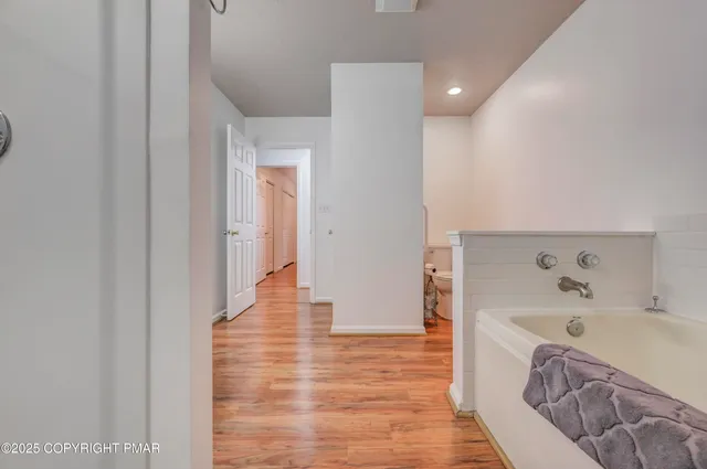 a view of livingroom with furniture and floor to ceiling window