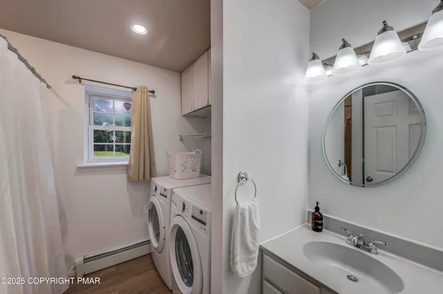 a storage room with washer and dryer