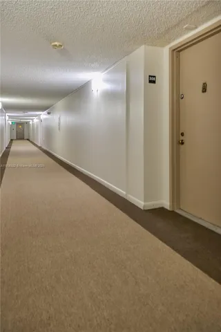 a living room with a couch and a table