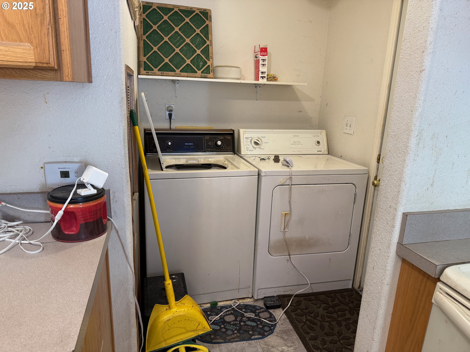 9071 Southwest Sand Ridge Road Terrebonne, OR 97760 - Photo 12 of 40 a utility room with dryer and washer