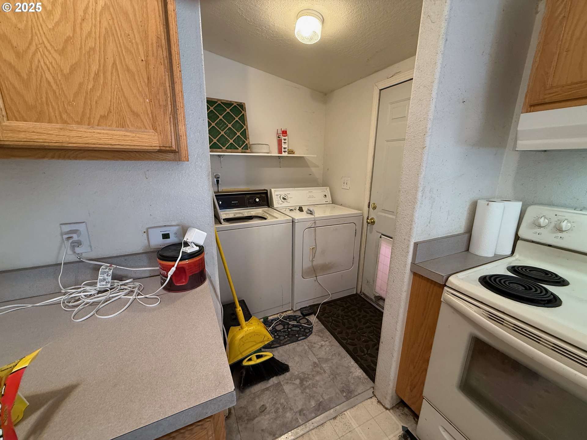 9071 Southwest Sand Ridge Road Terrebonne, OR 97760 - Photo 13 of 40 a room with storage and utility