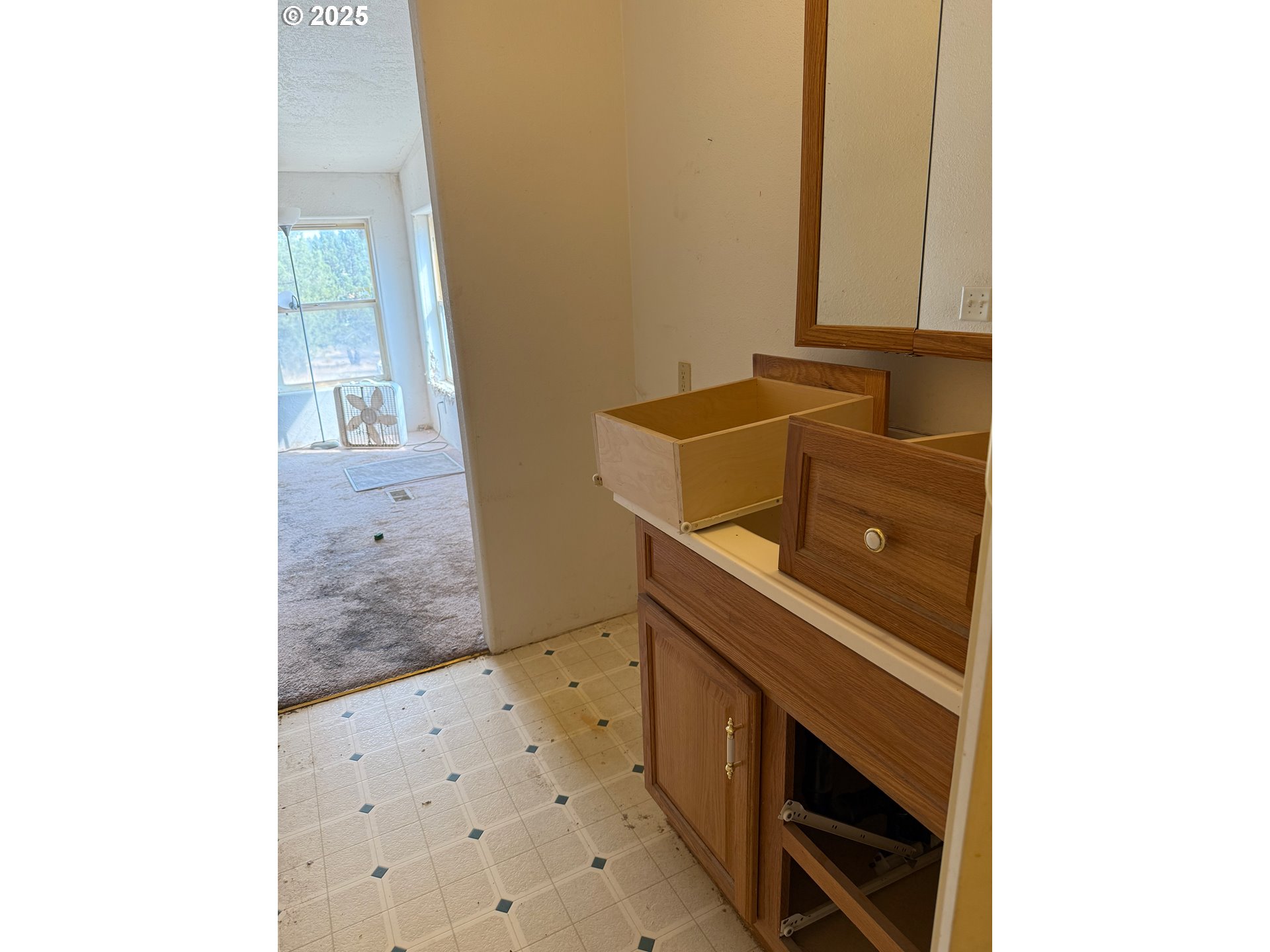9071 Southwest Sand Ridge Road Terrebonne, OR 97760 - Photo 18 of 40 a bathroom with a sink and a mirror