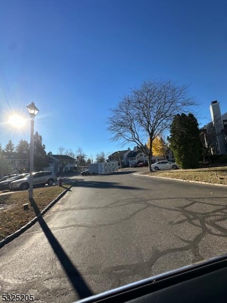 257 Kingbird Court Three Bridges, NJ 08887 - Photo 17 of 21 a view of swimming pool with furniture and city view