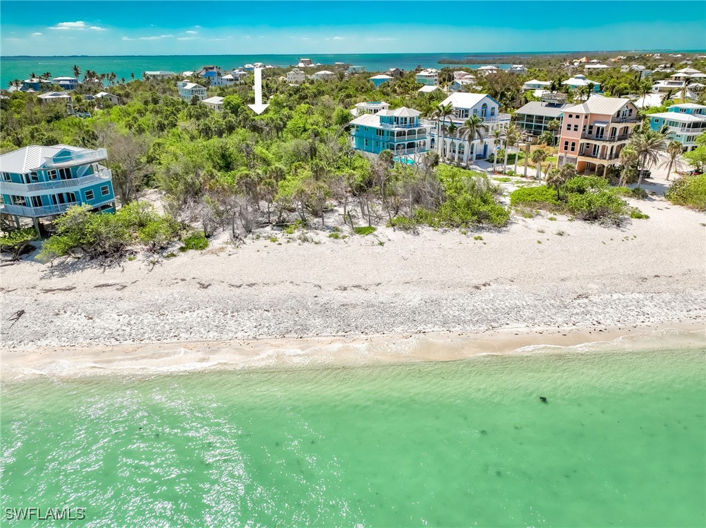 150 Hummingbird Drive Upper Captiva, FL 33924 - Photo 14 of 23 a view of a yard with an outdoor space