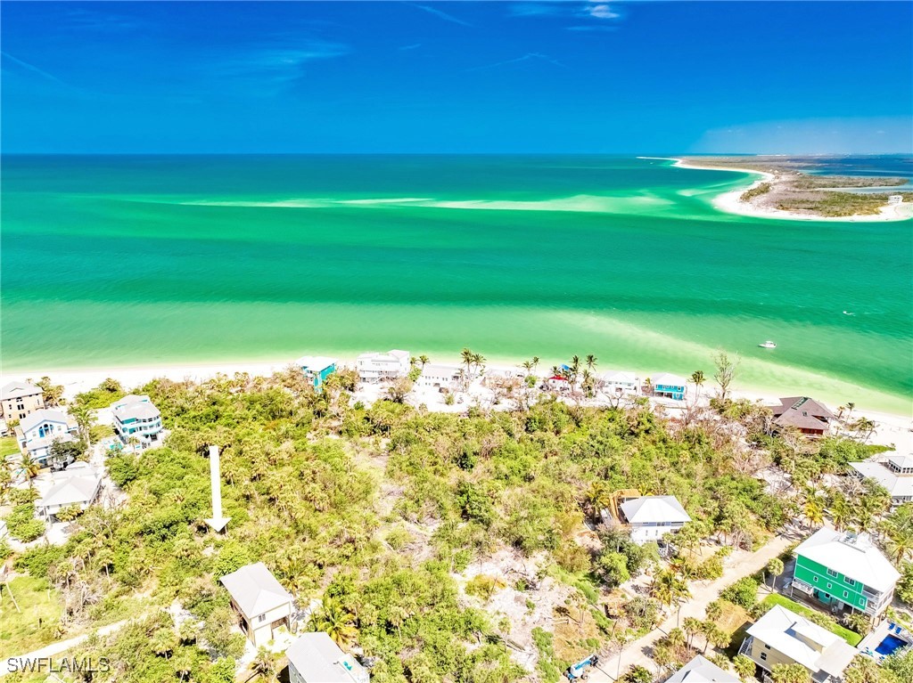 150 Hummingbird Drive Upper Captiva, FL 33924 - Photo 16 of 23 a view of a field with an ocean