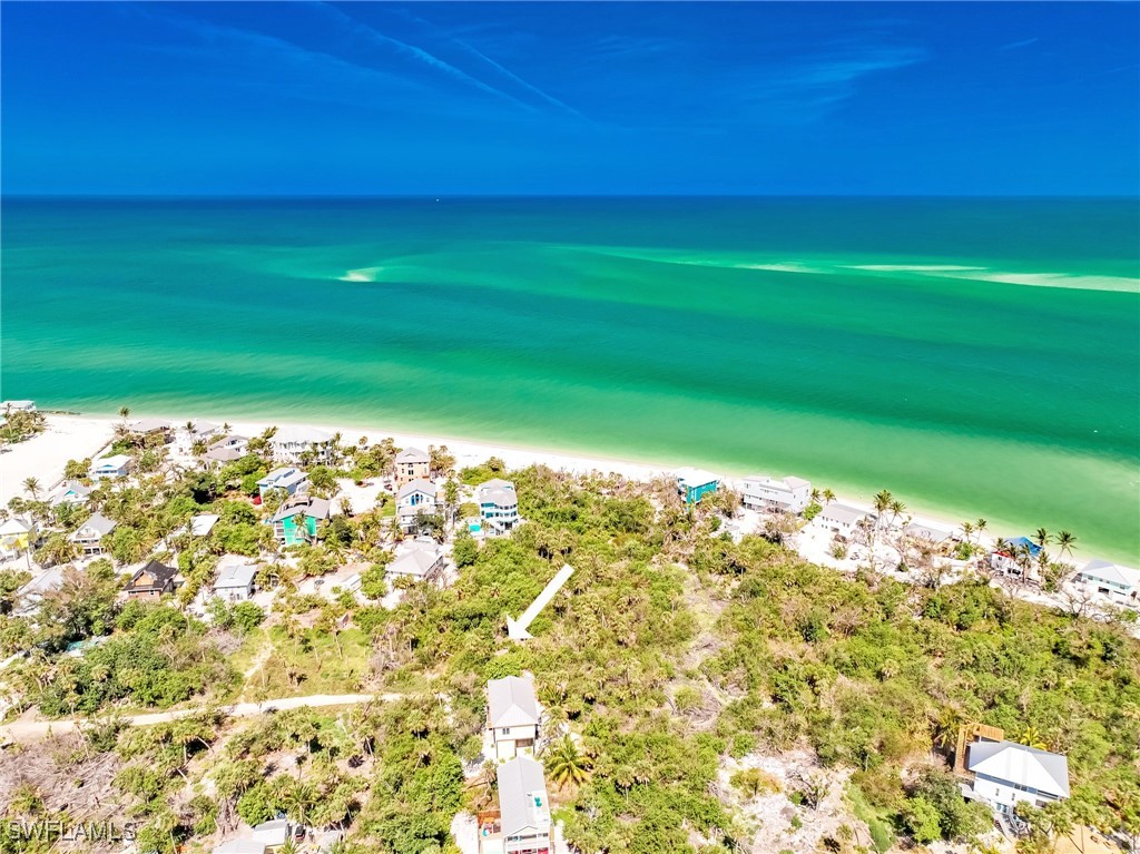 150 Hummingbird Drive Upper Captiva, FL 33924 - Photo 20 of 23 a view of yard with swimming pool and outdoor space
