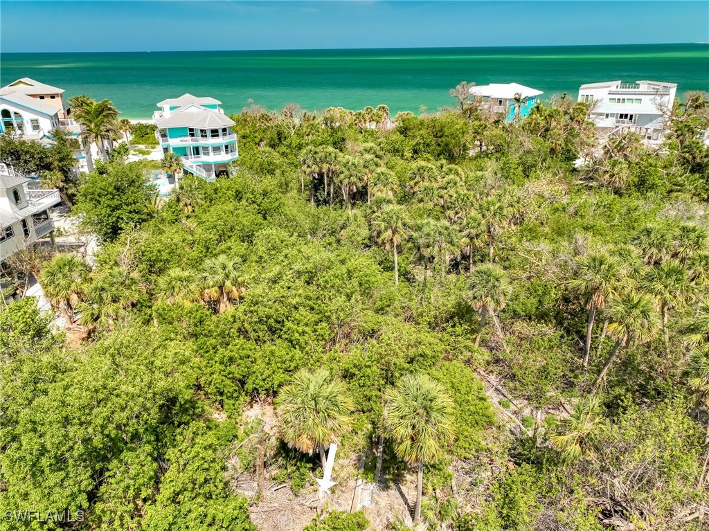 150 Hummingbird Drive Upper Captiva, FL 33924 - Photo 4 of 23 a view of a lake with a city