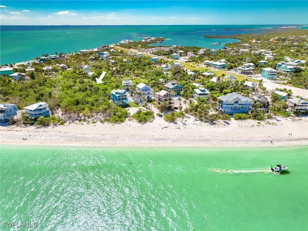 150 Hummingbird Drive Upper Captiva, FL 33924 - Photo 5 of 23 a view of yard with ocean view