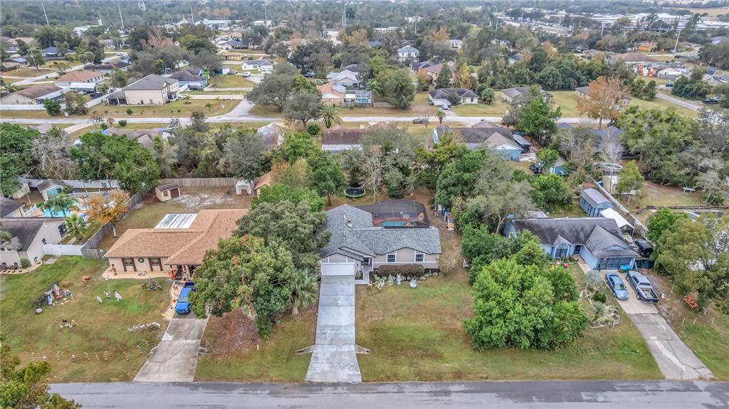 3137 Loblolly Street Deltona, FL 32725 - Photo 28 of 30 an aerial view of residential houses with outdoor space