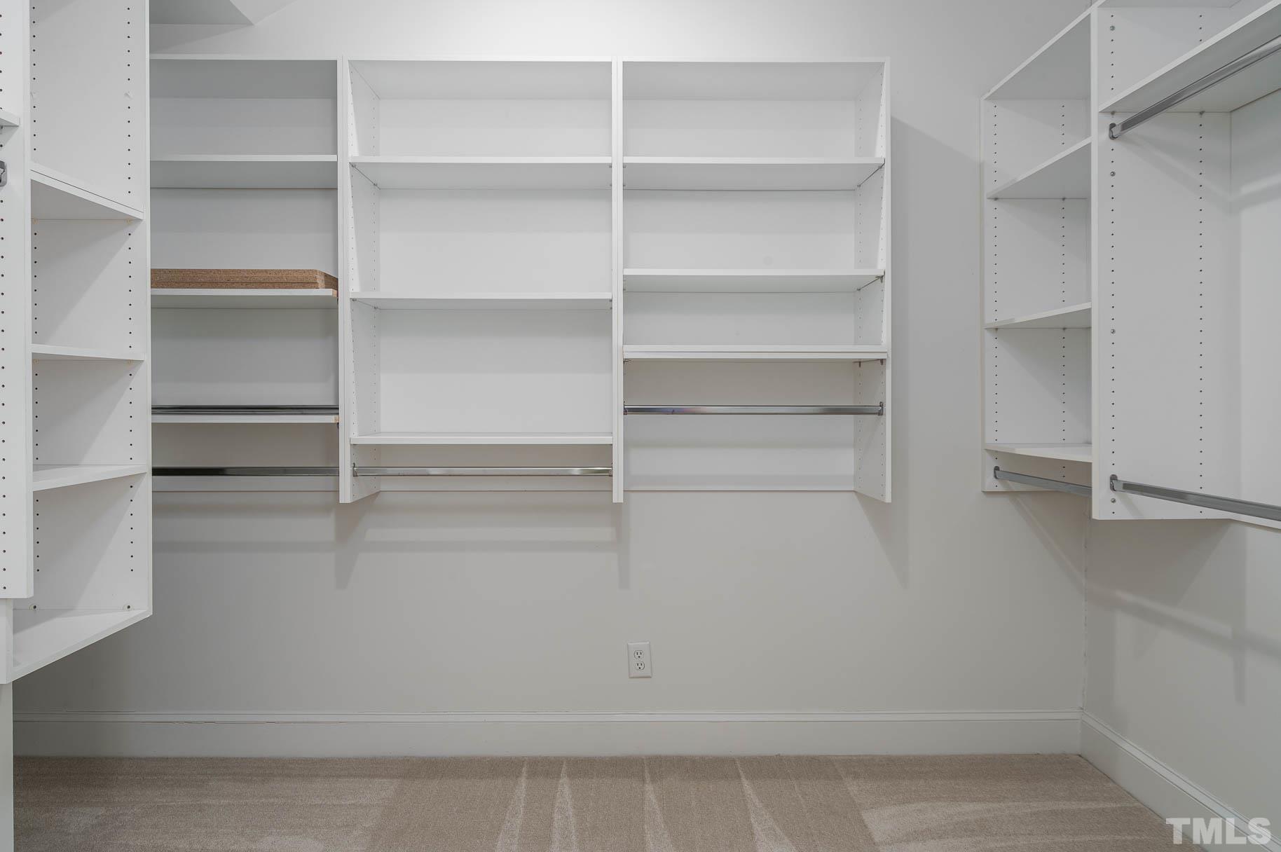 3 McDowell Pittsboro, NC 27312 - Photo 12 of 29 a view of walk in closet with empty racks