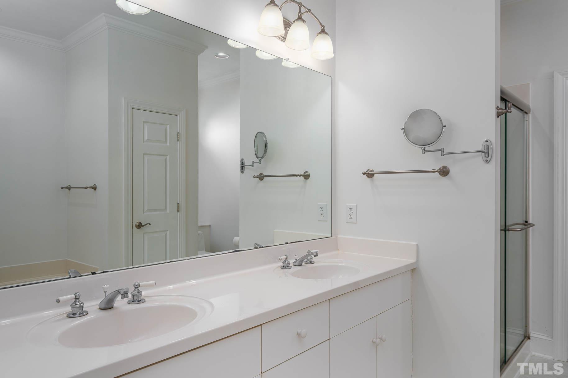 3 McDowell Pittsboro, NC 27312 - Photo 14 of 29 a bathroom with a sink and a mirror