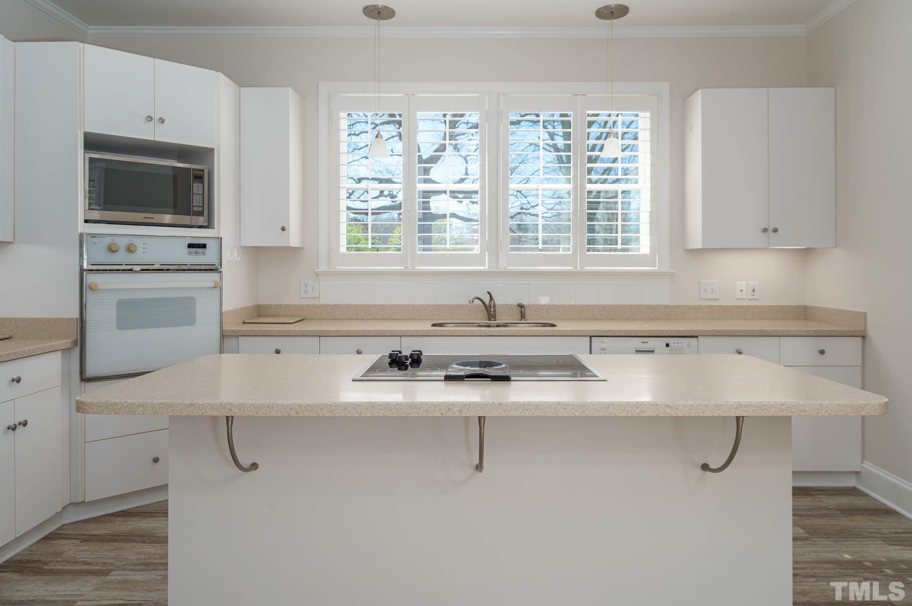 3 McDowell Pittsboro, NC 27312 - Photo 4 of 29 a bathroom with a sink and a washing machine
