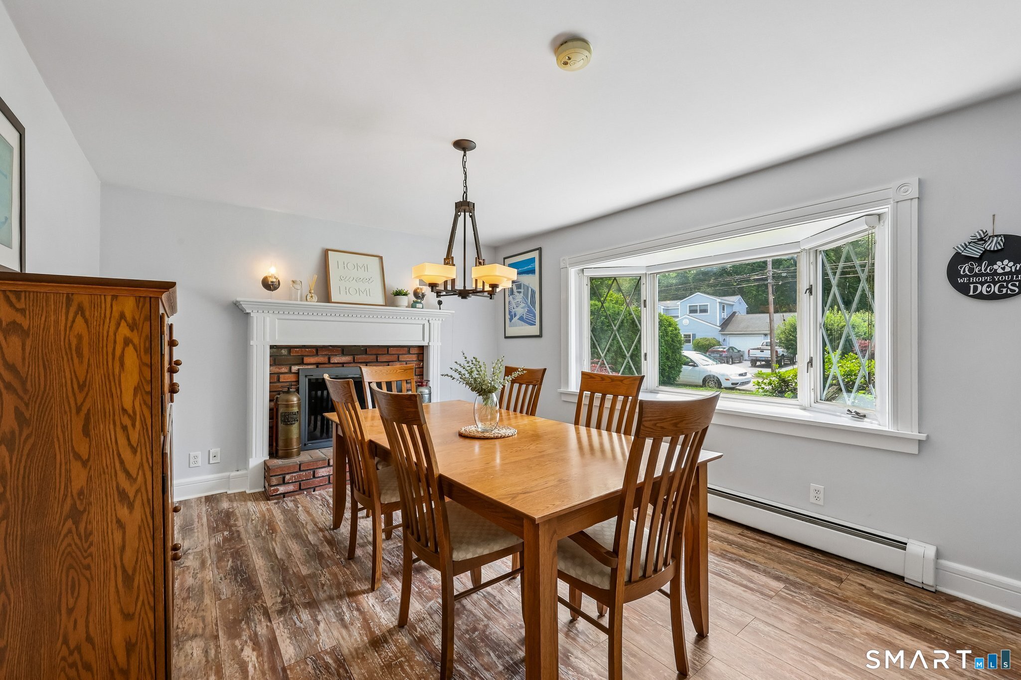 21 Friendly Road Norwalk, CT 06851 - Photo 10 of 28 A dining room should encompass warmth, light, space - this dining room has it ALL!! Fireplace, bay window and plenty of room for a large dining table to gather family and friends!