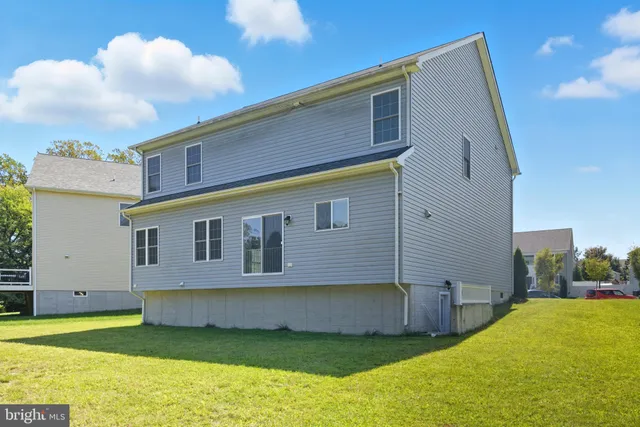 a picture of a bathroom with a shower