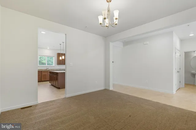 a view of a room with a chandelier
