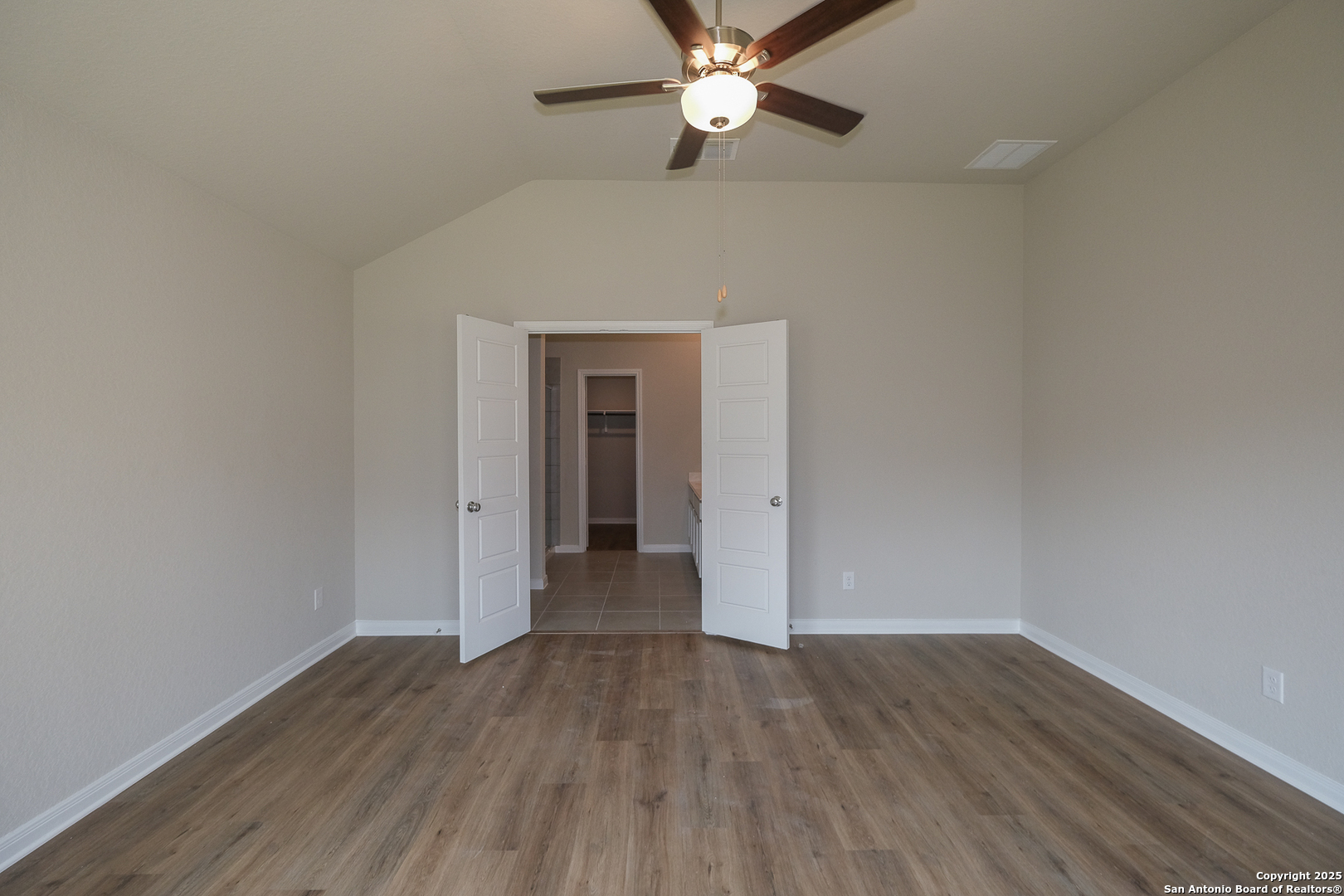 1124 Water Valley Seguin, TX 78155 - Photo 15 of 39 a view of an empty room with wooden floor