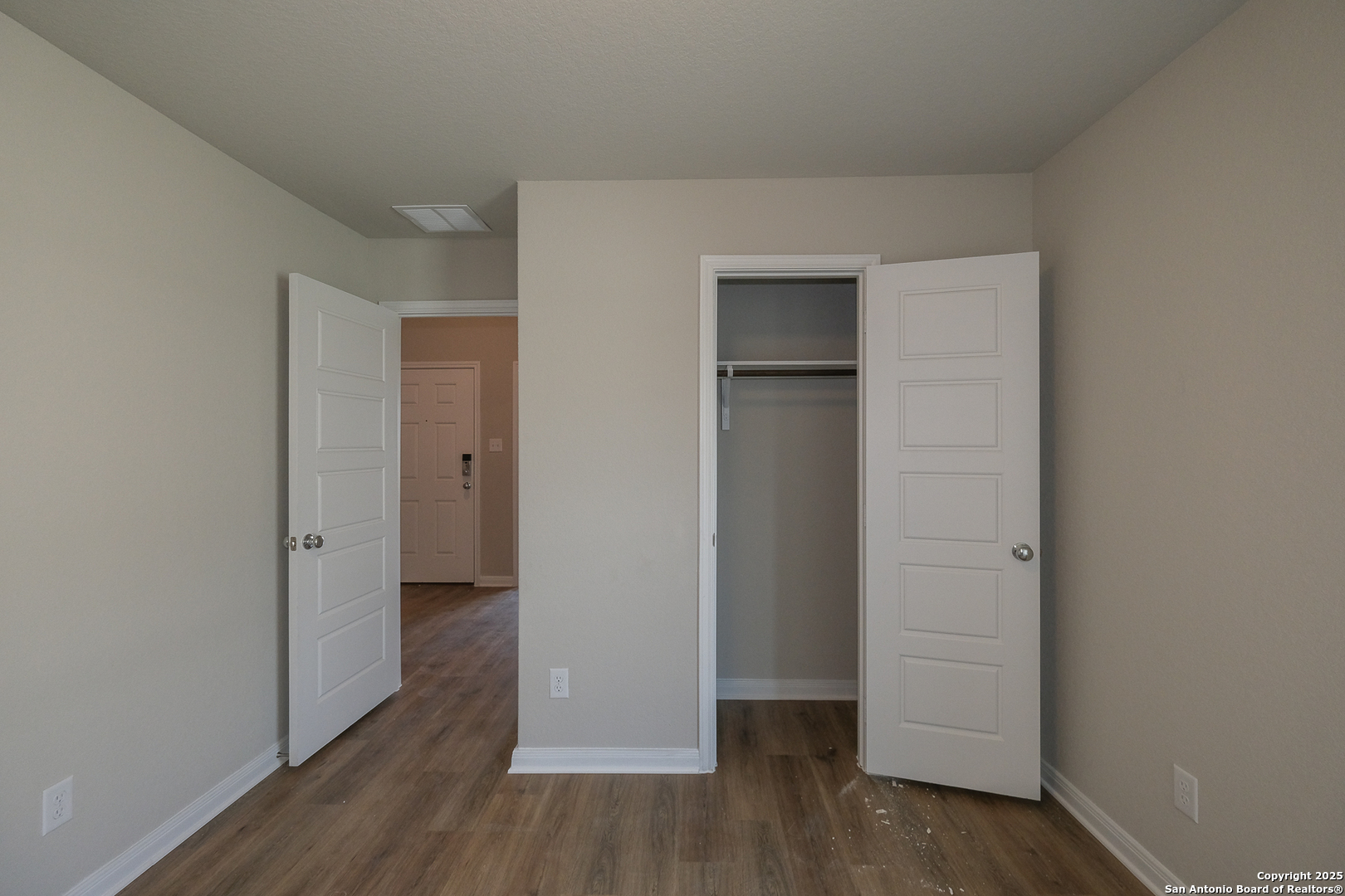 1124 Water Valley Seguin, TX 78155 - Photo 21 of 39 wooden floor & closet in a room