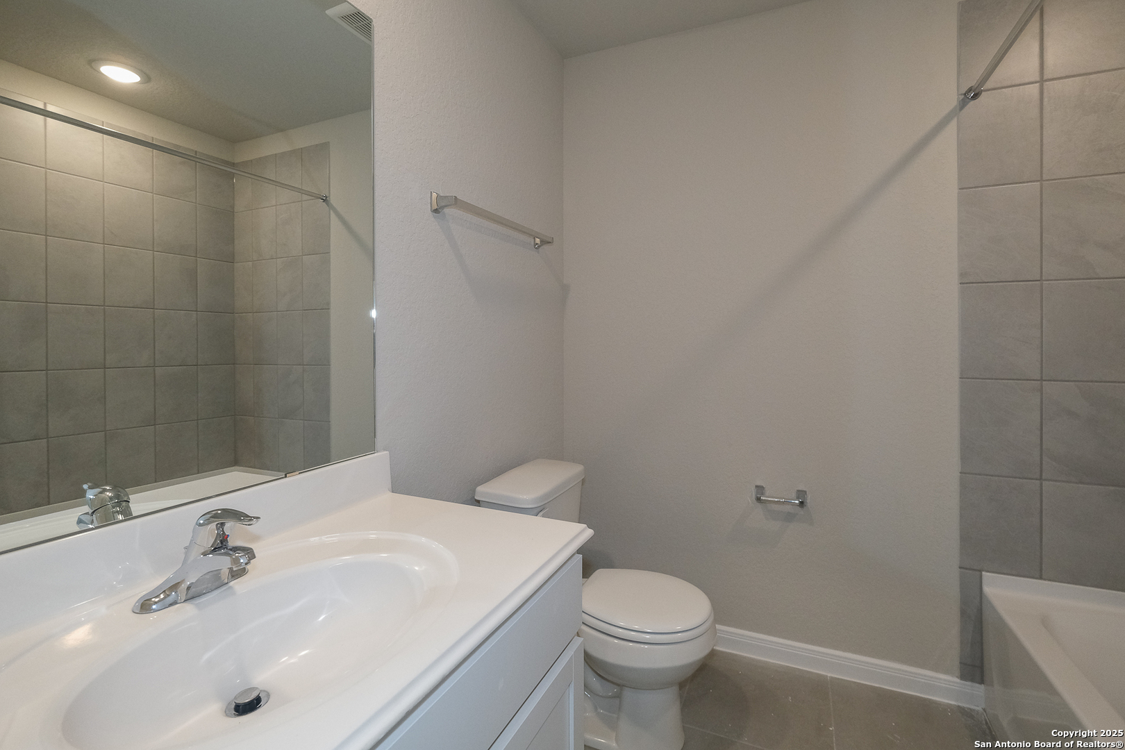 1124 Water Valley Seguin, TX 78155 - Photo 25 of 39 a bathroom with a sink a toilet and shower