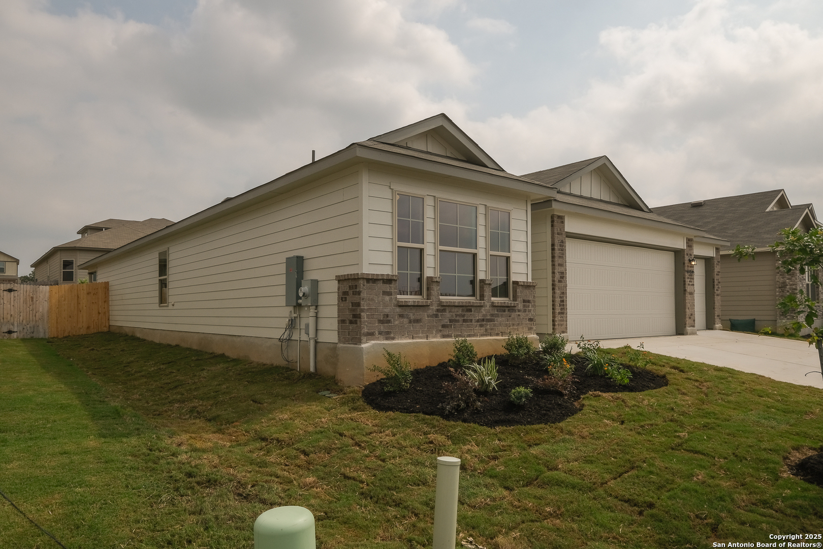 1124 Water Valley Seguin, TX 78155 - Photo 30 of 39 a view of a house with a small yard plants and large tree
