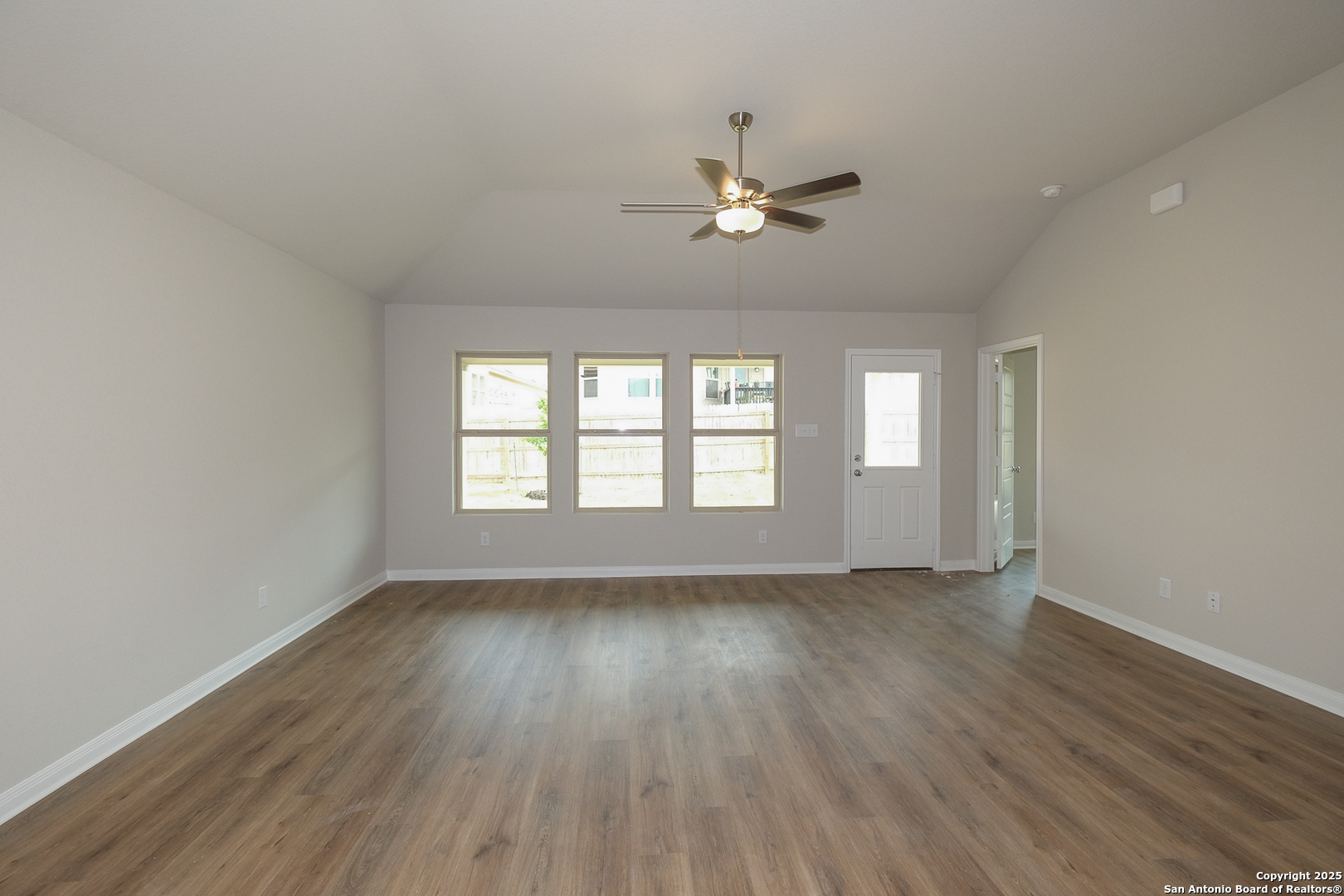 1124 Water Valley Seguin, TX 78155 - Photo 9 of 39 a view of empty room with wooden floor and fan