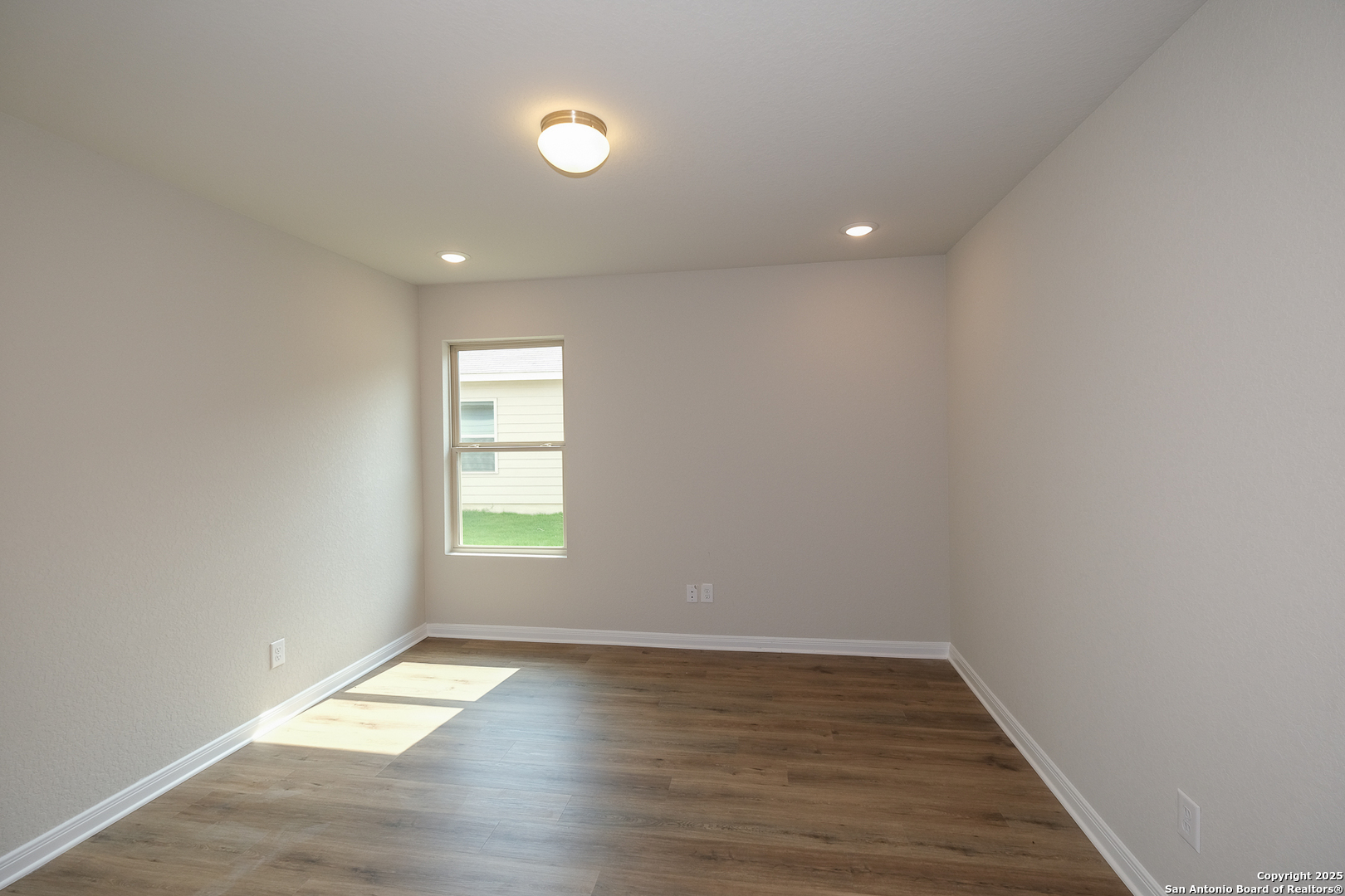 1124 Water Valley Seguin, TX 78155 - Photo 10 of 39 a view of empty room with wooden floor and fan