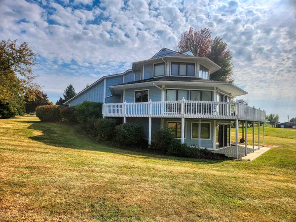a view of a house with a swimming pool