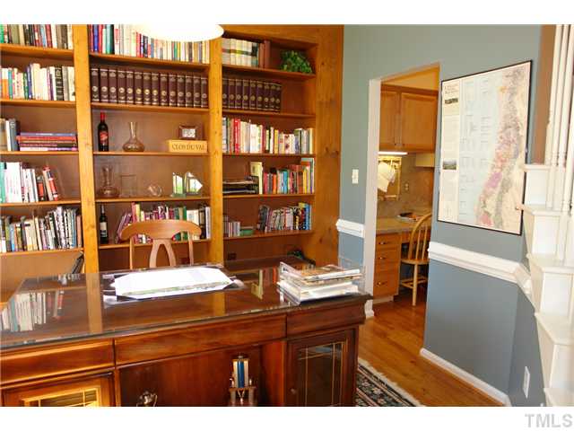 12205 Freemont Lane Raleigh, NC 27613 - Photo 3 of 25 a kitchen view with a table and chairs