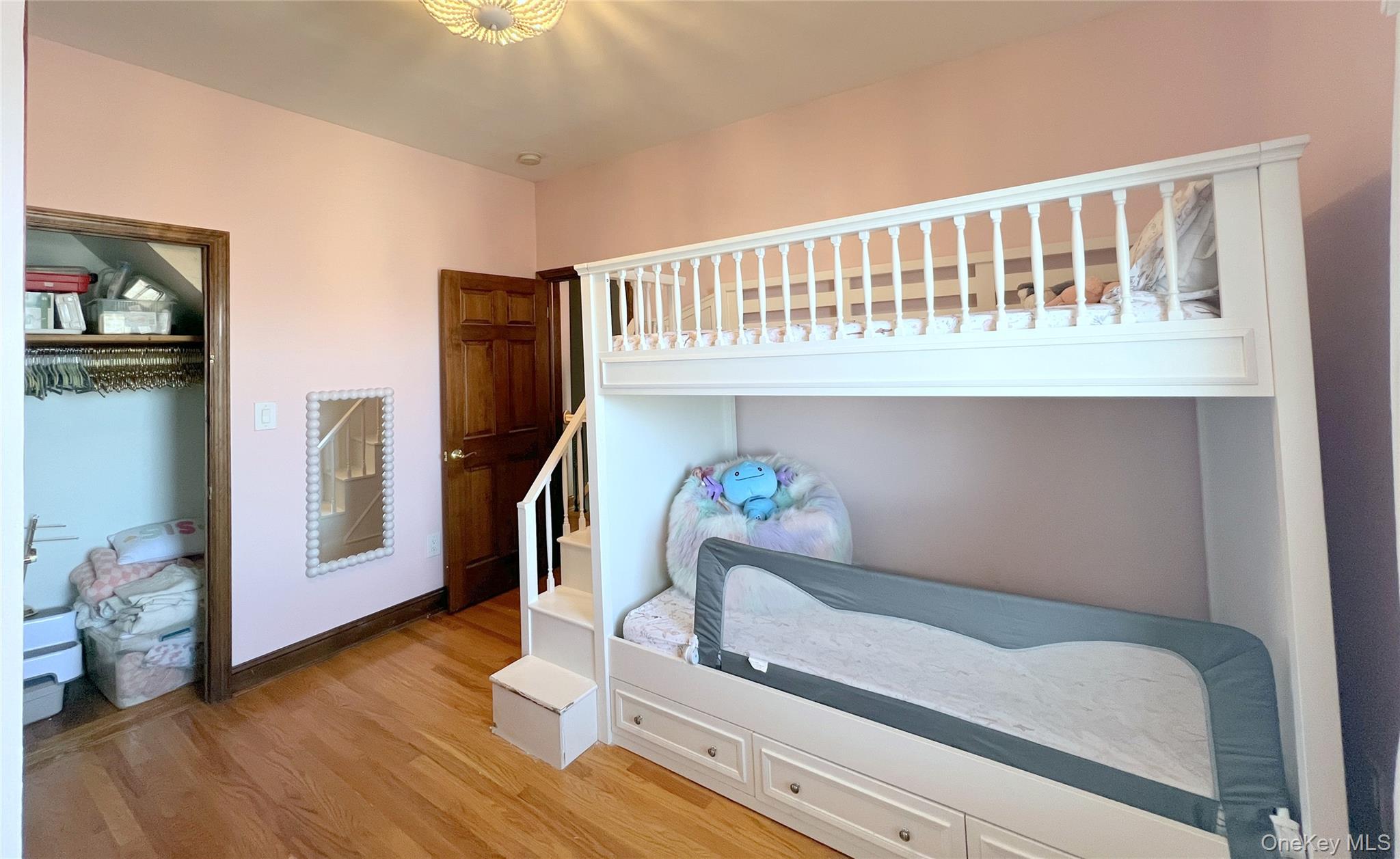 67-31 52nd Road Queens, NY 11378 - Photo 11 of 21 Bedroom with wood finished floors and baseboards
