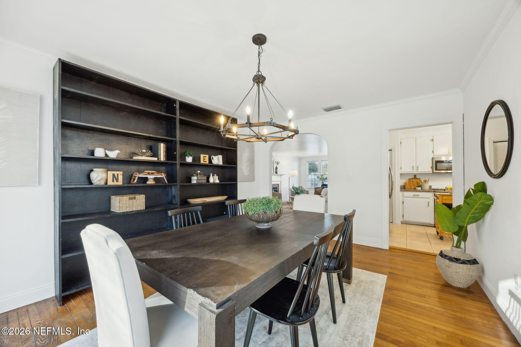 1626 Brookwood Road Jacksonville, FL 32207 - Photo 13 of 98 a view of a dining room with furniture wooden floor and chandelier
