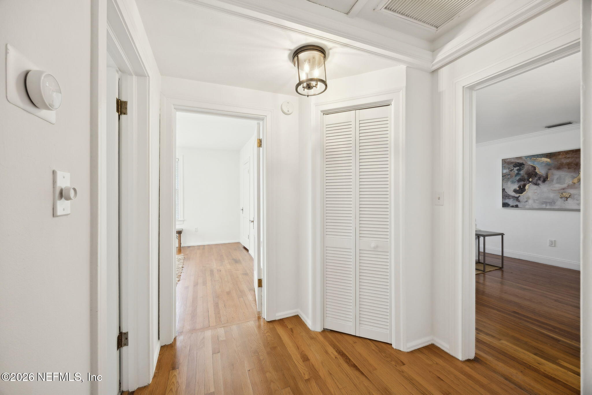 1626 Brookwood Road Jacksonville, FL 32207 - Photo 22 of 98 a view of a hallway with wooden floor and closet area