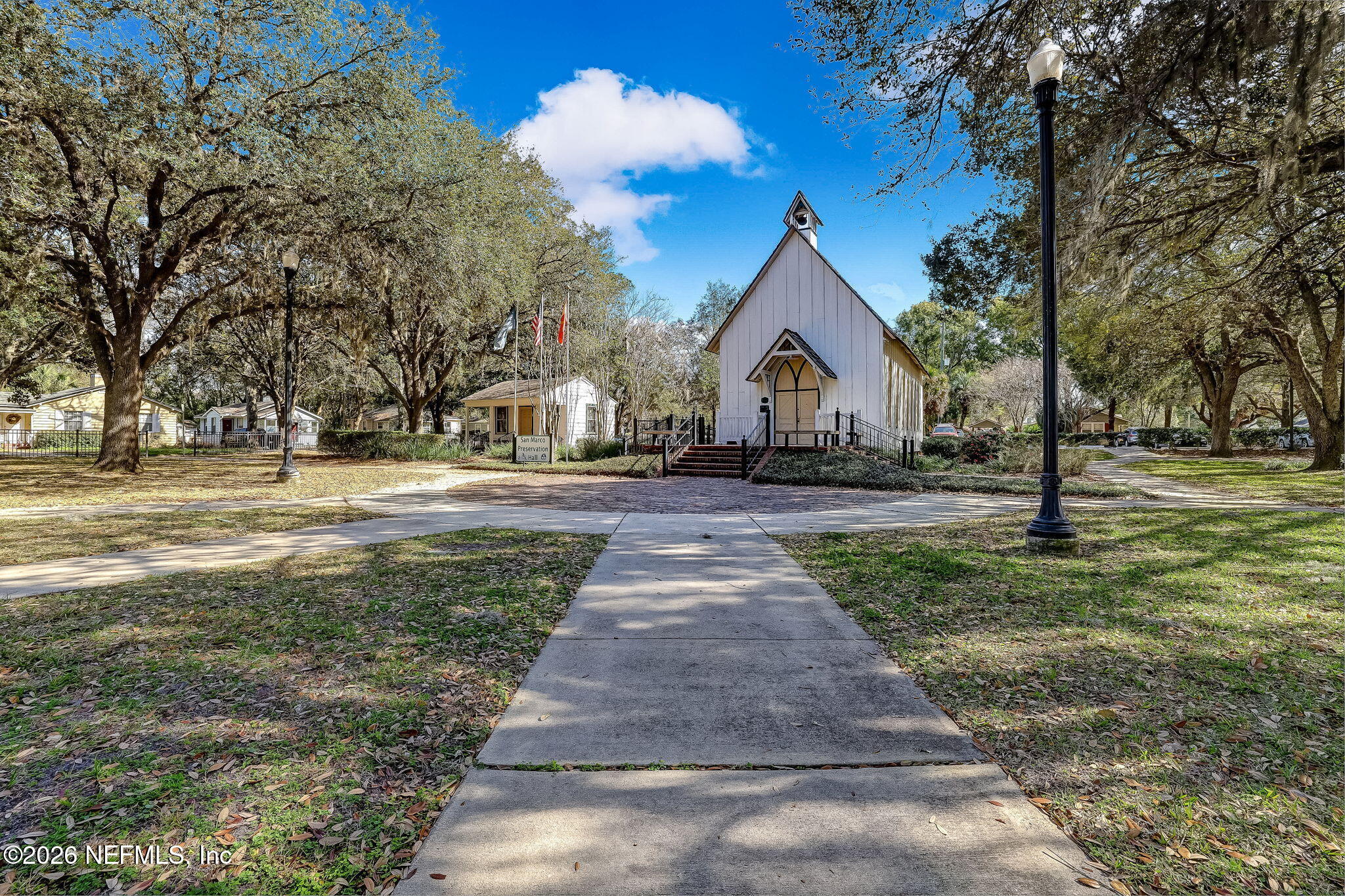 1626 Brookwood Road Jacksonville, FL 32207 - Photo 59 of 98 a front view of a house with a yard and trees