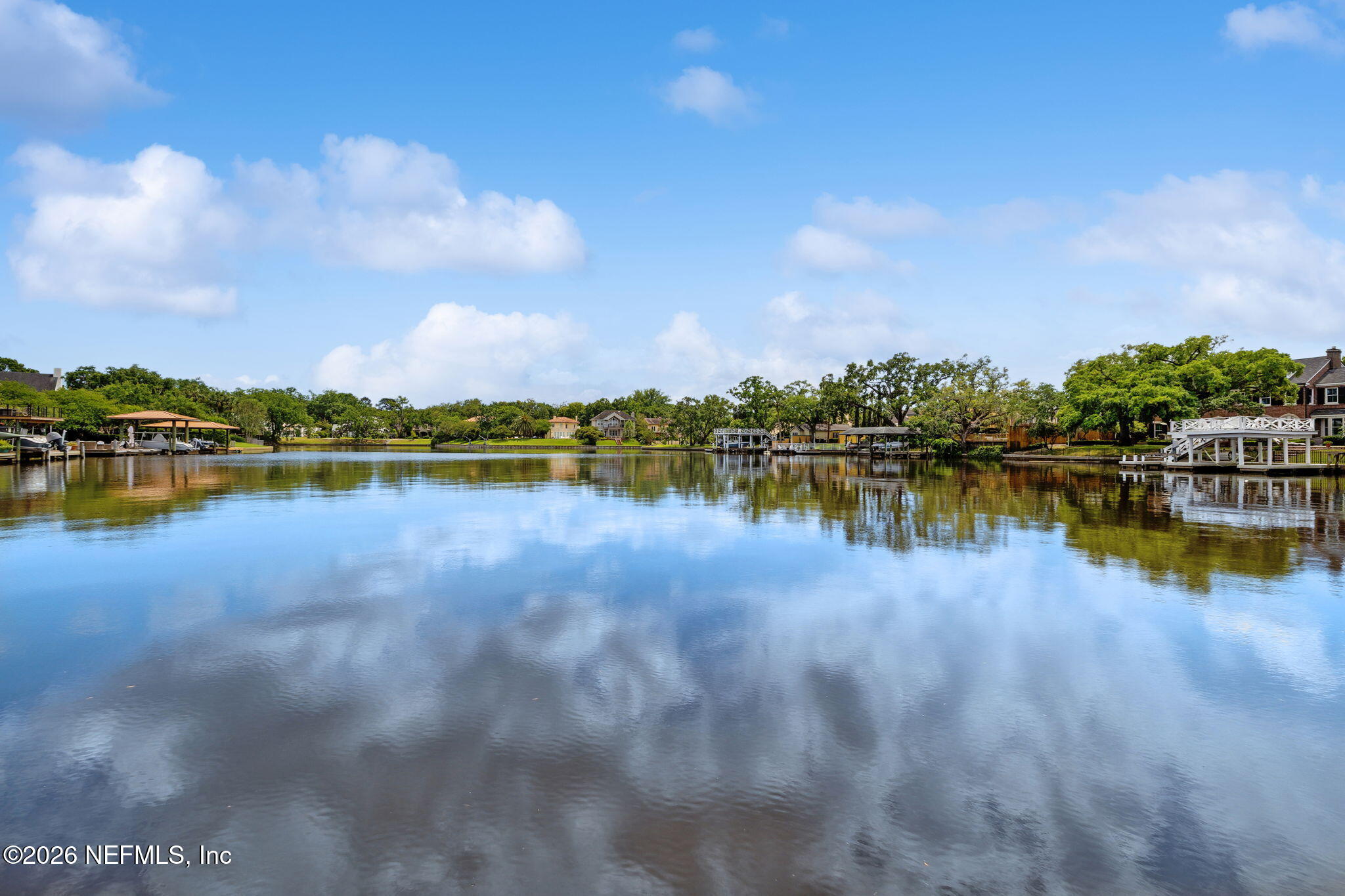 1626 Brookwood Road Jacksonville, FL 32207 - Photo 65 of 98 a view of a lake with houses in the back
