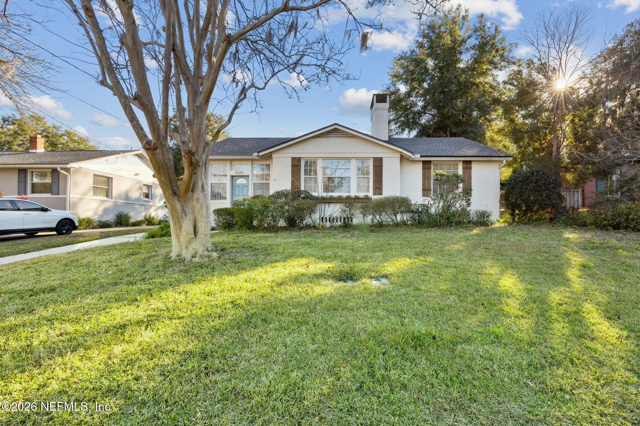 1626 Brookwood Road Jacksonville, FL 32207 - Photo 98 of 98 a front view of a house with a yard