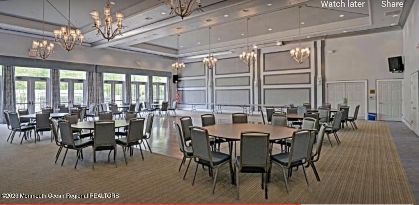 1 Lusitano Road Manalapan, NJ 07726 - Photo 54 of 59 a view of a dining room with furniture window and outside view