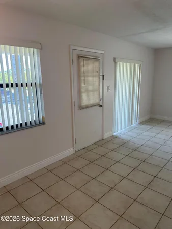 a view of a livingroom with wooden floor