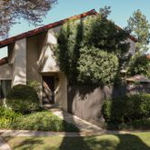 a backyard of a house with lots of green space