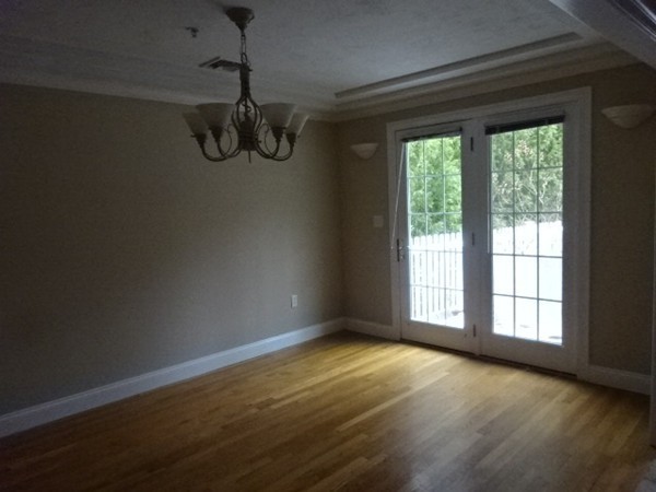 32 Pommogussett Road, Unit 8 Rutland, MA 01543 - Photo 8 of 15 a view of an empty room with a window