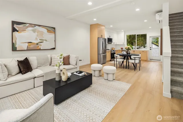 a living room with furniture and a table