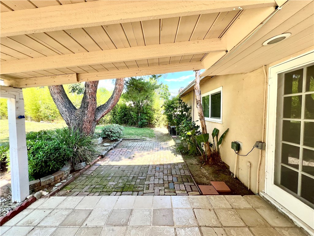 3835 Canfield Road Pasadena, CA 91107 - Photo 14 of 15 a front view of a house with garden